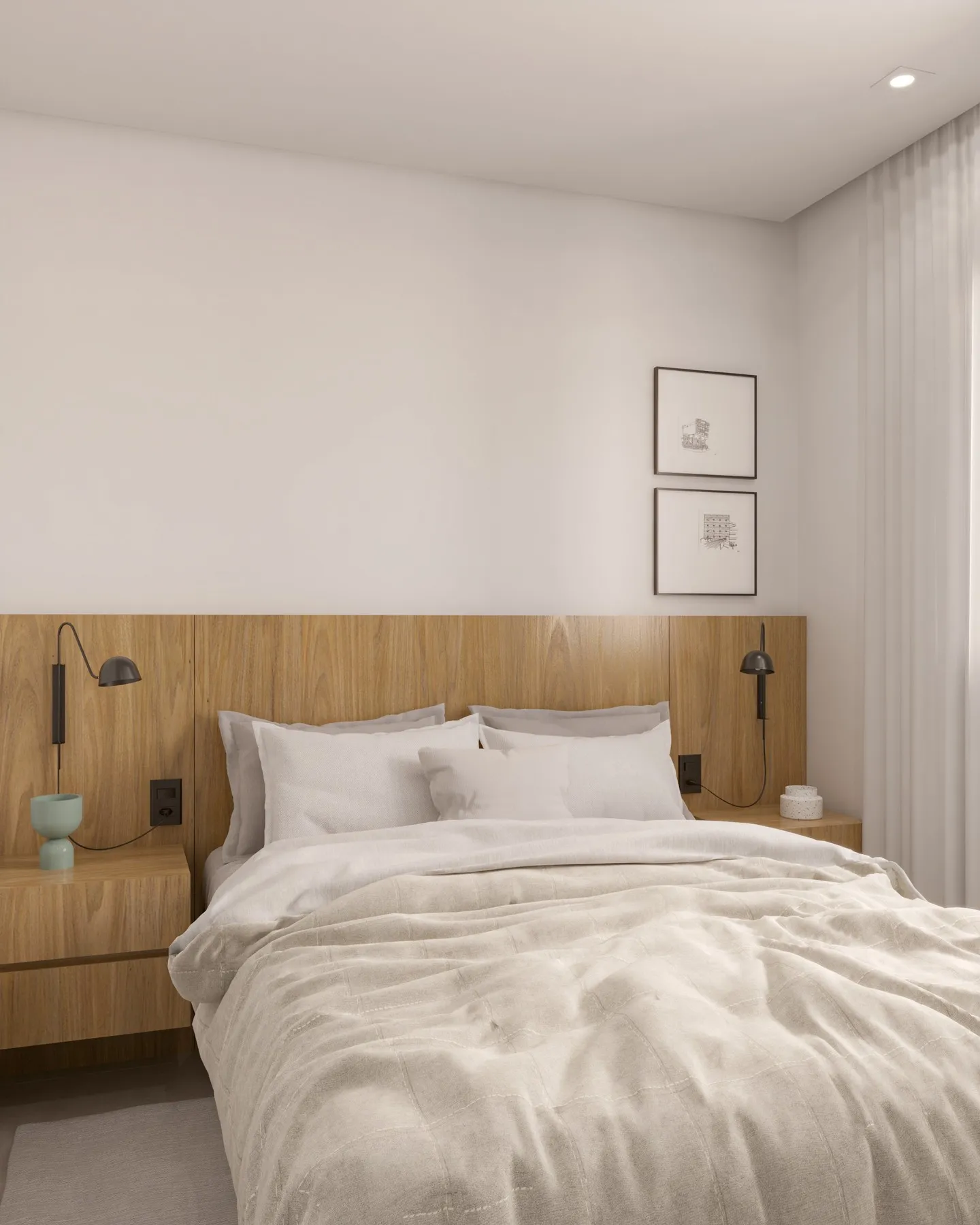 Dormitório do apto 58 com quadros sobre a cama