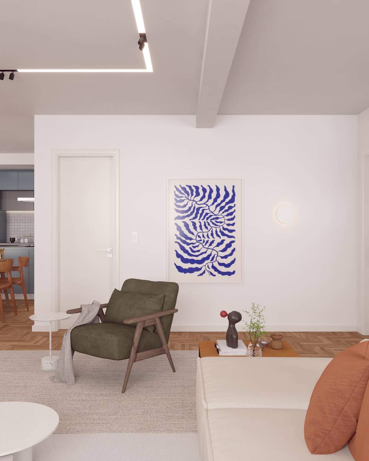 Sala de estar do apto 42 em render: poltrona verde-oliva, quadro azul e tapete claro